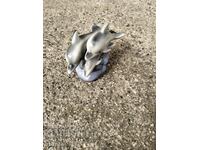 Porcelain figurine of dolphins