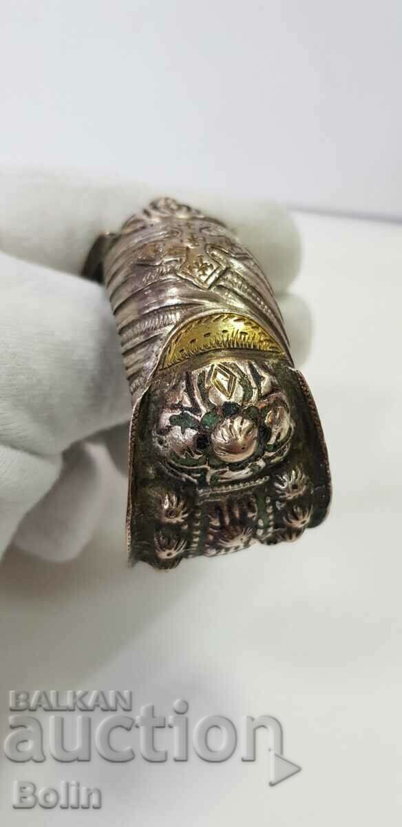 A rare 19th-20th century enamel renaissance silver slingshot bracelet