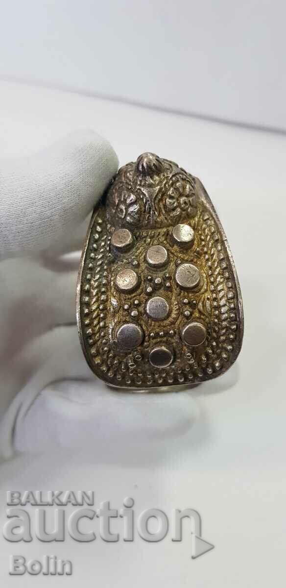 A rare 19th century revival silver slingshot bracelet with gilding with price 380.00 BGN | € 194.29