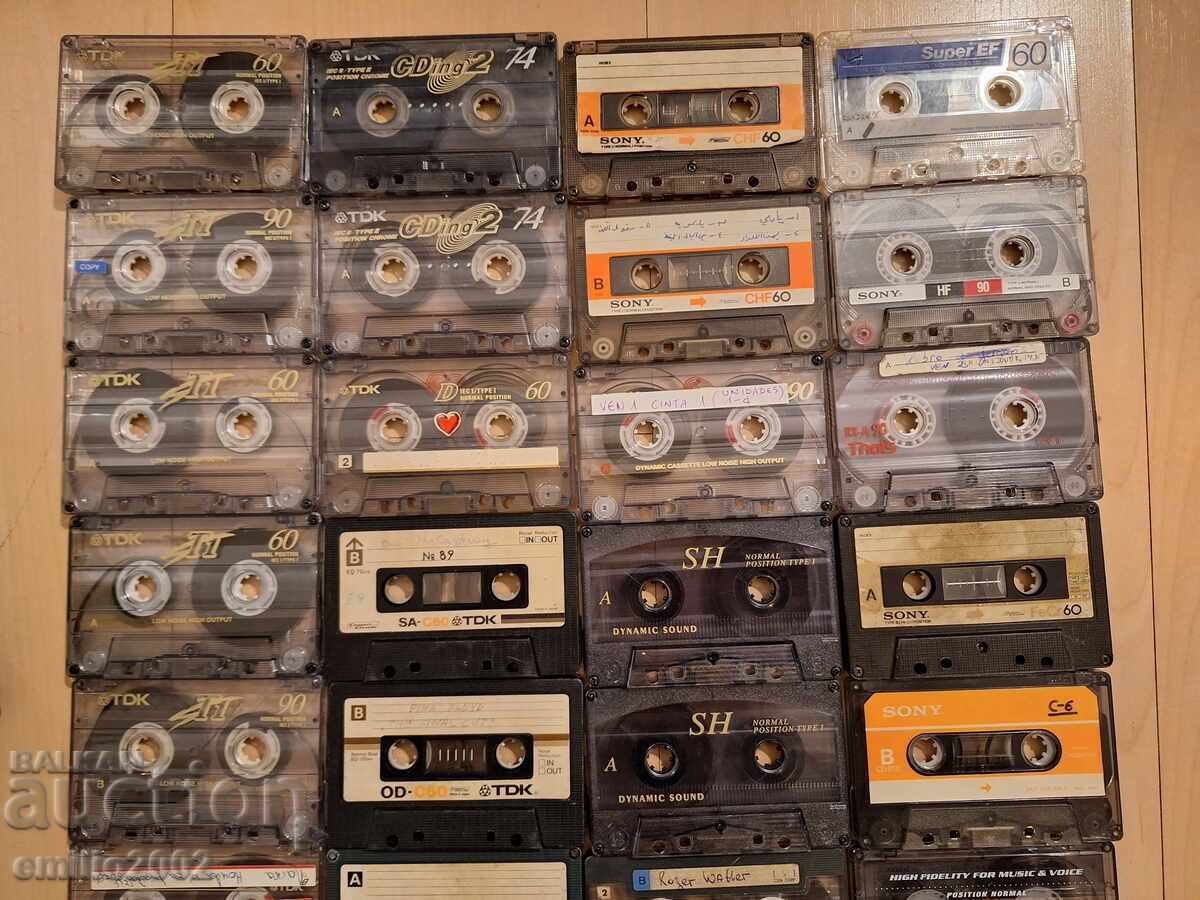 Auction TDK and Sony audio cassettes 32pcs in a carousel stand Auction TDK and Sony audio cassettes 32pcs in a carousel stand