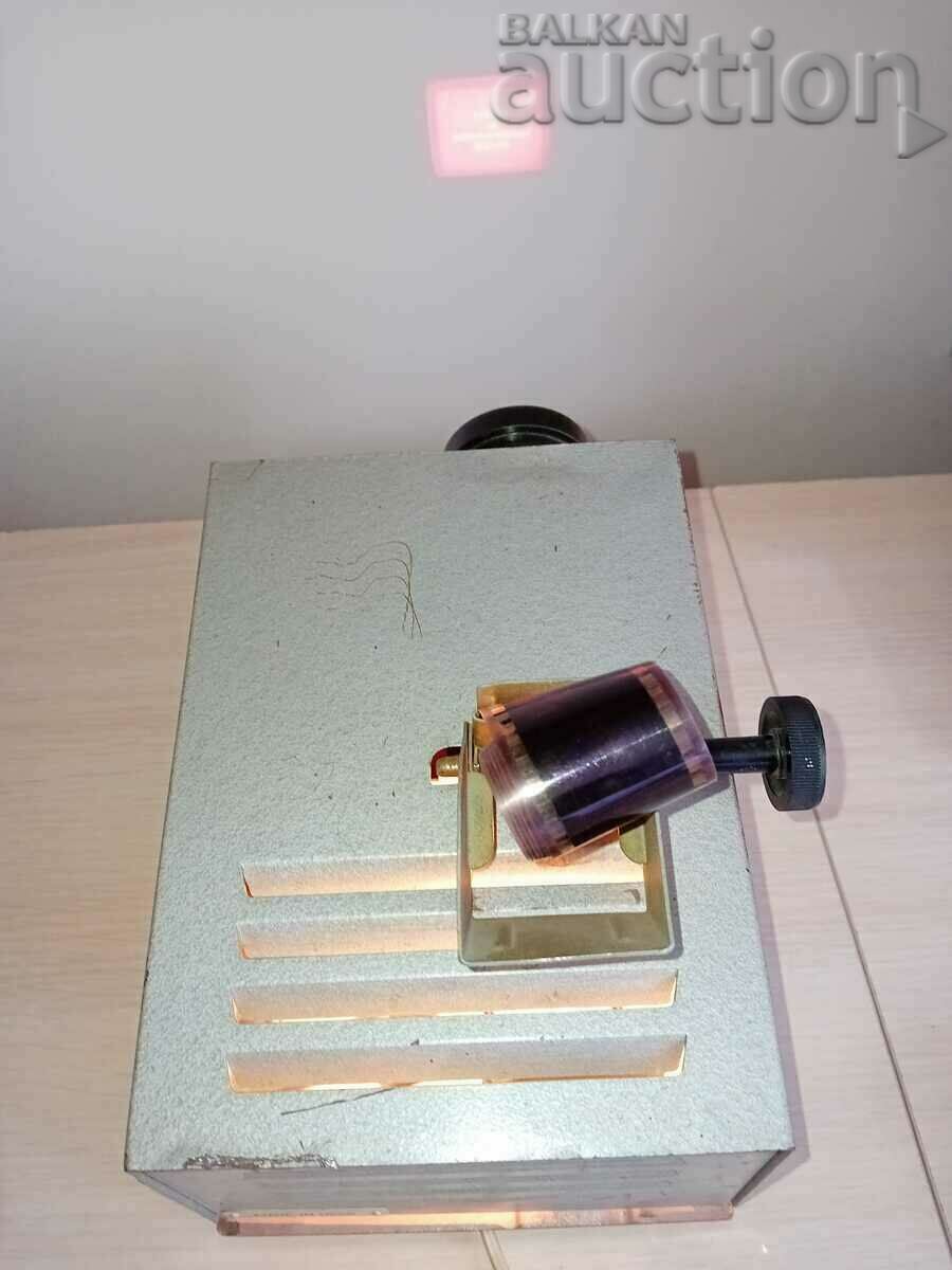 an old projection device with filmstrips from the 70s an old projection device with filmstrips from the 70s