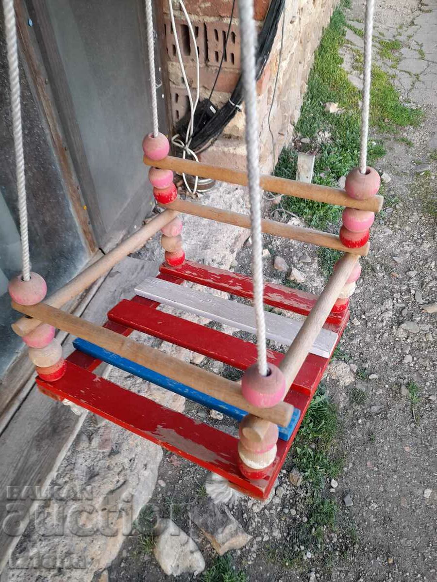Delivery of Old wooden children's swing Delivery of Old wooden children's swing
