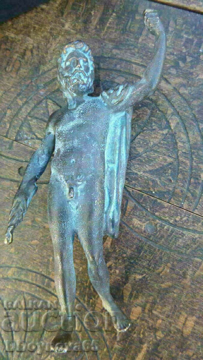 Licitație O replică din bronz a unui zeu roman sau grec
