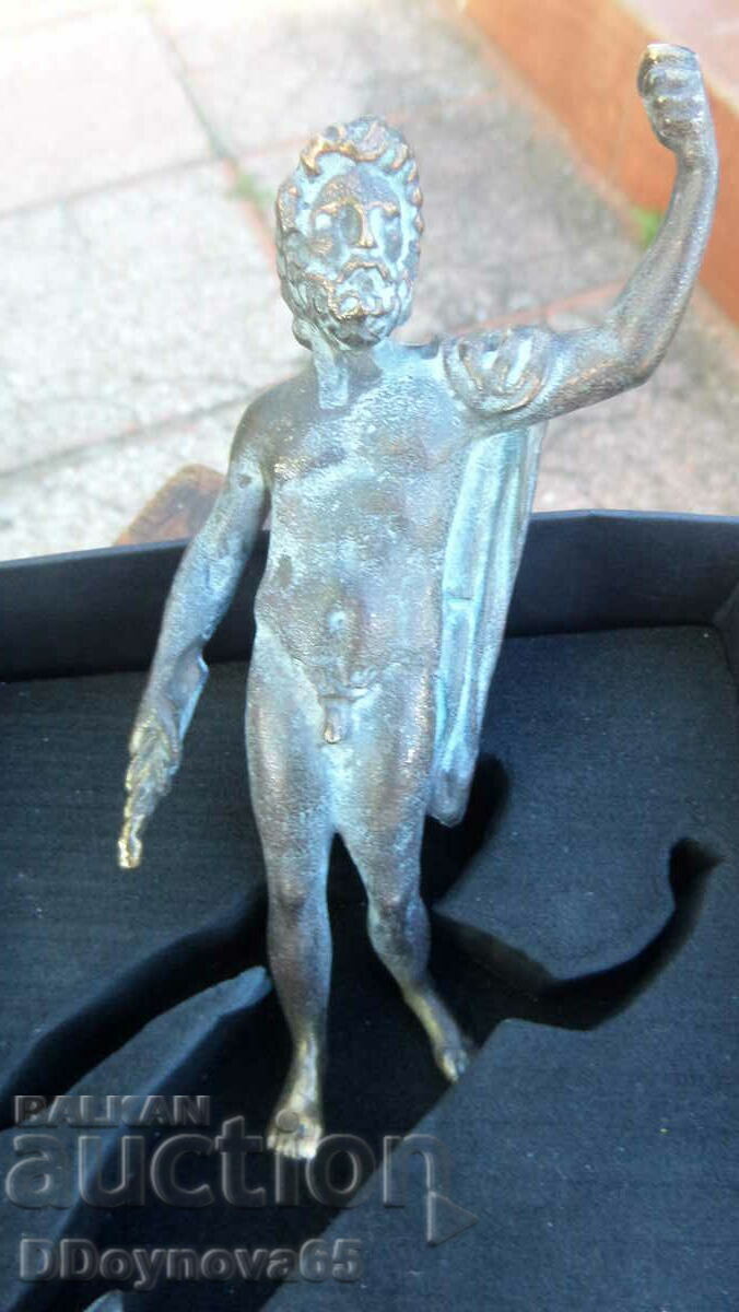 A bronze replica of a Roman or Greek god