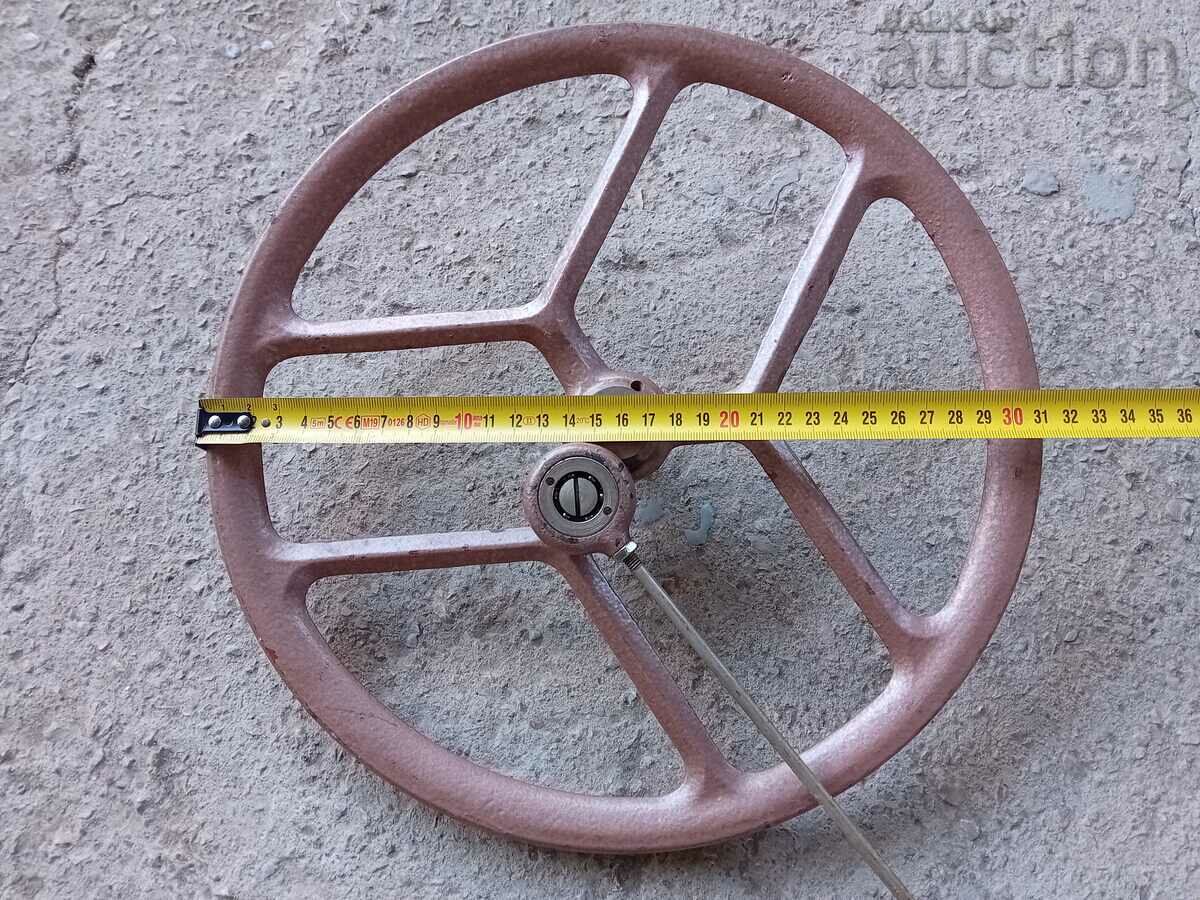 Delivery of antique cast iron sewing machine wheel Delivery of antique cast iron sewing machine wheel