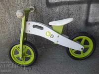 Children's wooden bicycle without pedals