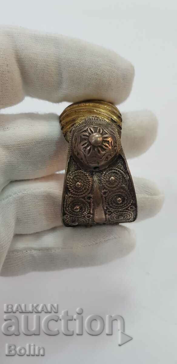 Delivery of A very rare model of a gilt revival slingshot bracelet Delivery of A very rare model of a gilt revival slingshot bracelet