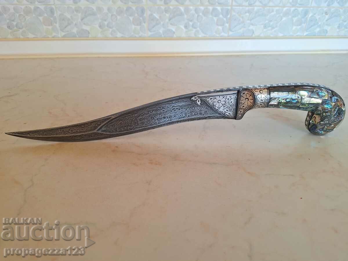 39 cm. Silver, Damascus steel, mother of pearl. Hand forged card.