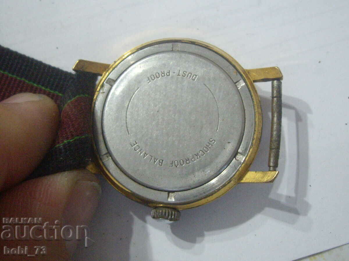 Auction  Russian gold-plated watch.