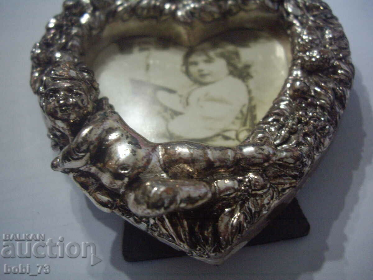 Silver photo frame. with price 150.00 BGN | € 76.69 Silver photo frame. with price 150.00 BGN | € 76.69