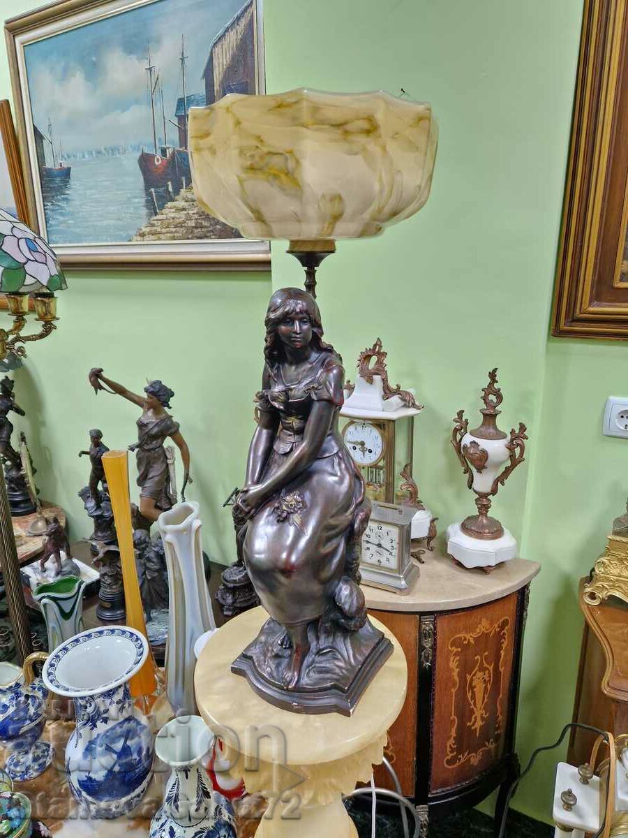 A lovely antique Dutch figural table lamp