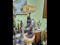 A lovely antique Dutch figural table lamp