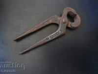 Old small pliers, marking
