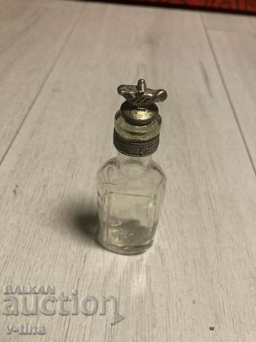 Παλιό μπουκάλι άρωμα υλικό τριαντάφυλλο λαδιού