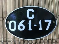 Old enamel motorcycle license plate