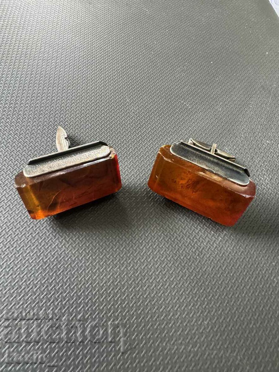 Old silver cuffs with amber