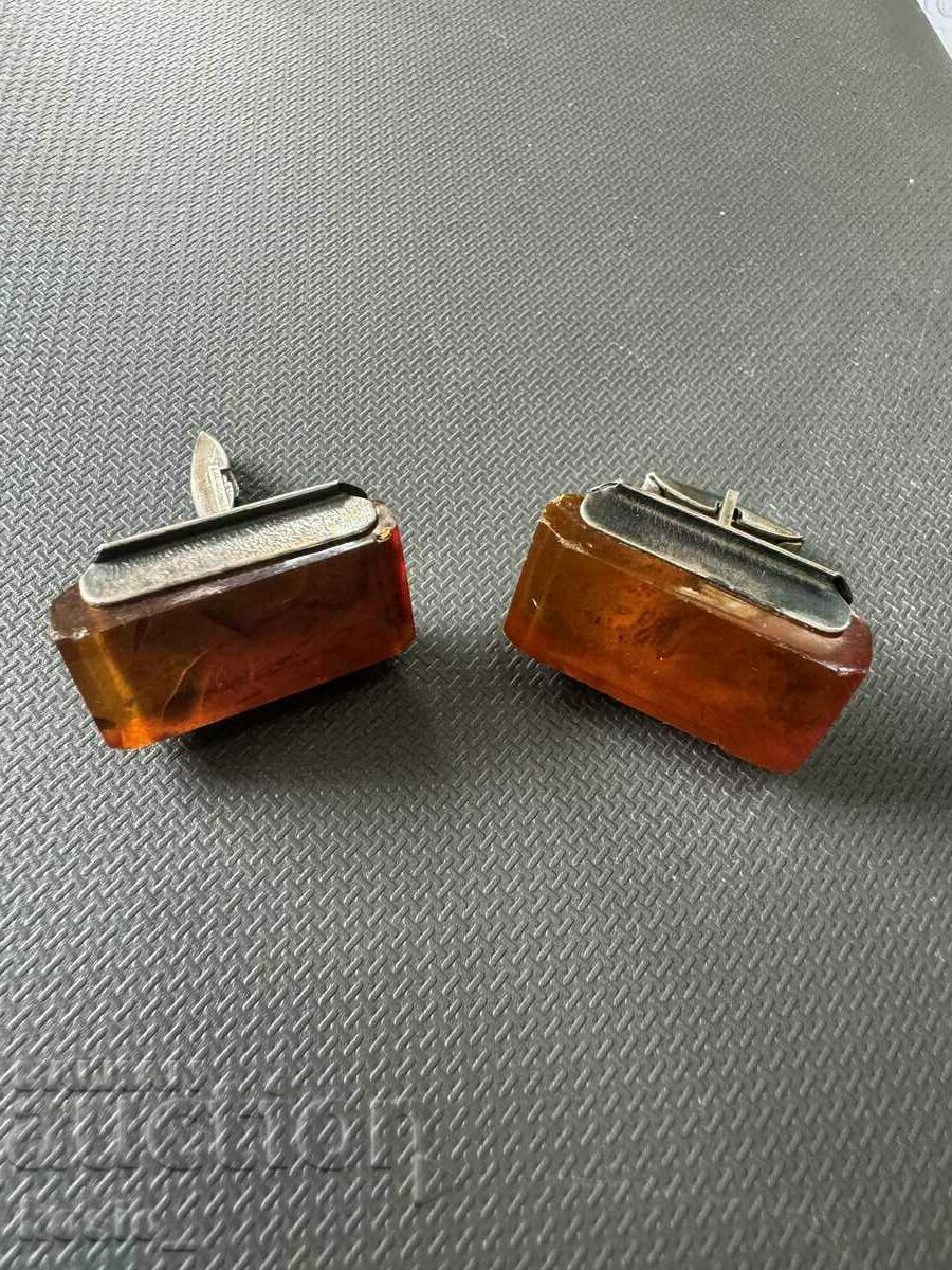 Old silver cuffs with amber