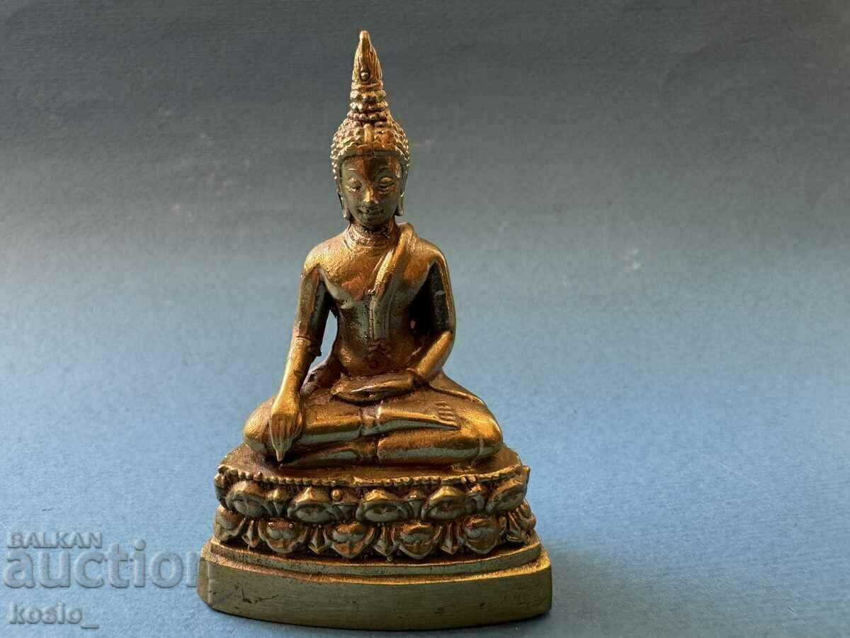 A small bronze Buddha