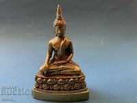 A small bronze Buddha