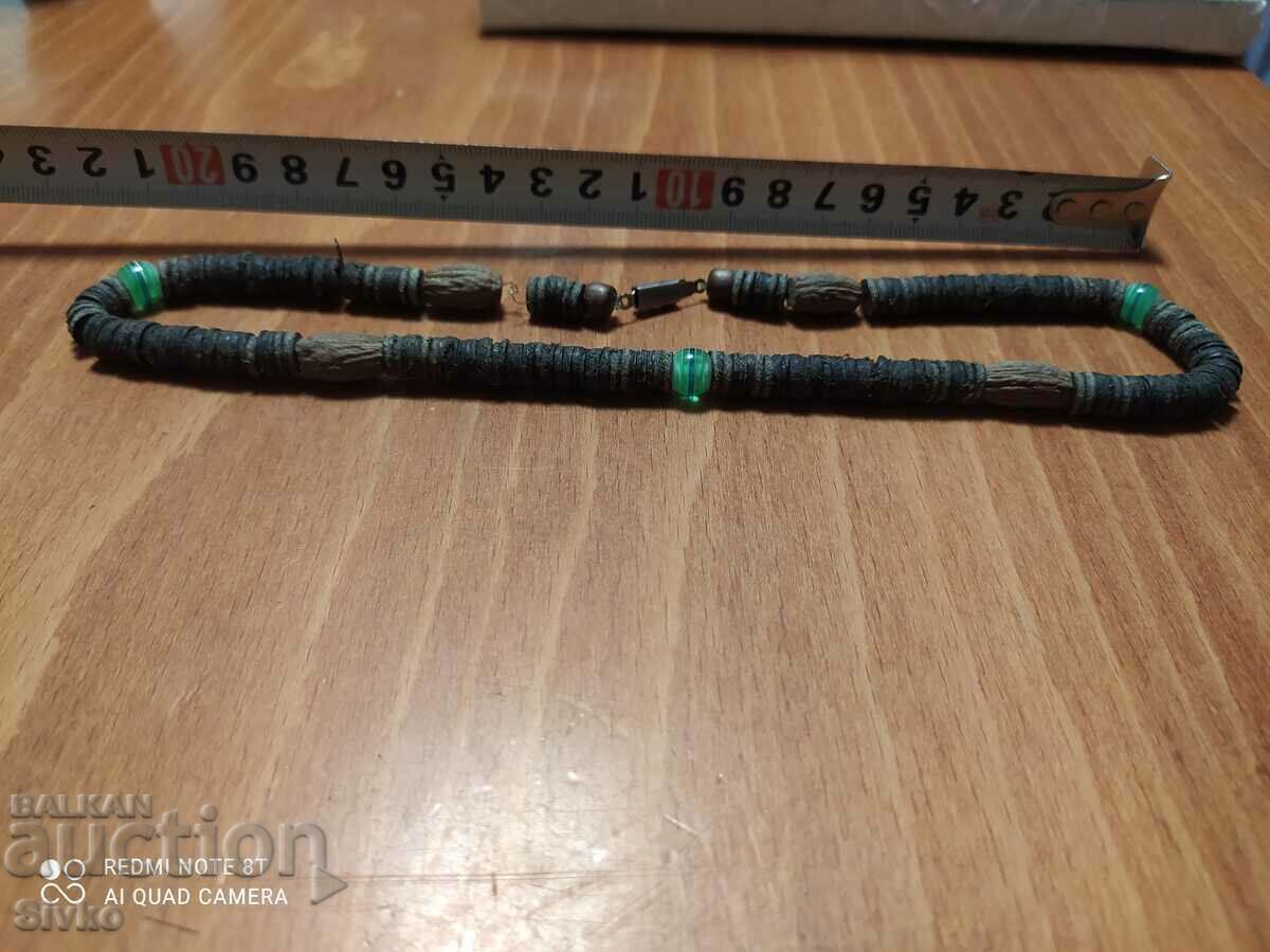 Necklace of natural materials with plastic stones Necklace of natural materials with plastic stones