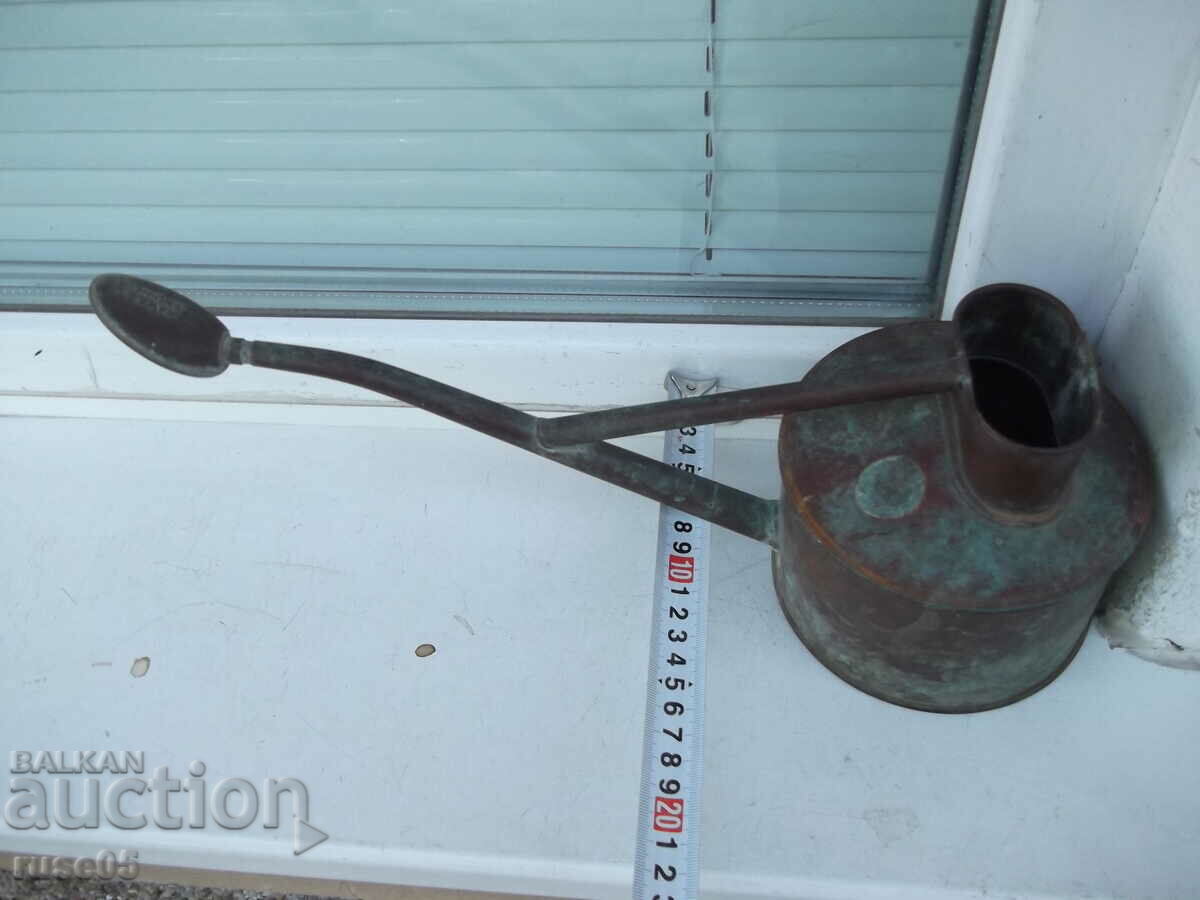 Old copper watering can with price 30.00 BGN | € 15.34 Old copper watering can with price 30.00 BGN | € 15.34