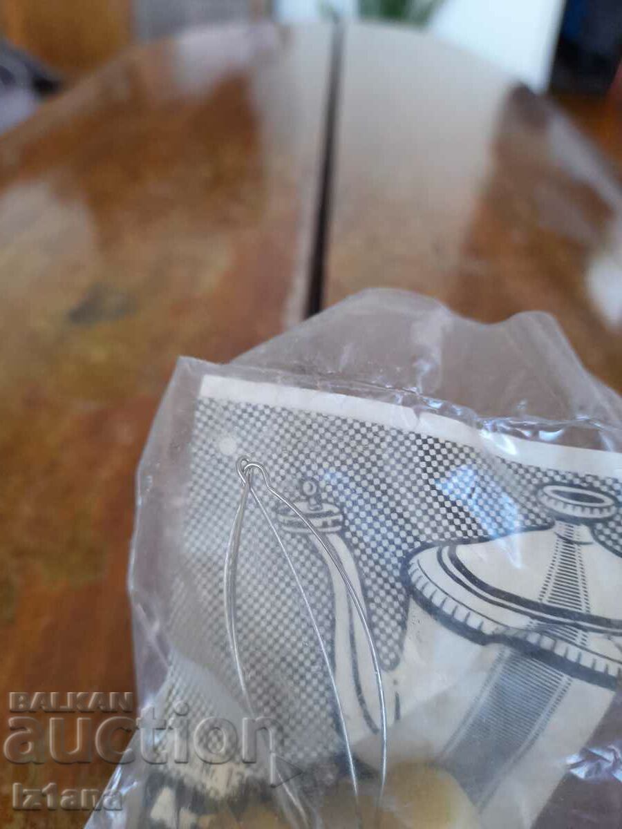 Auction  Old teapot spout stopper