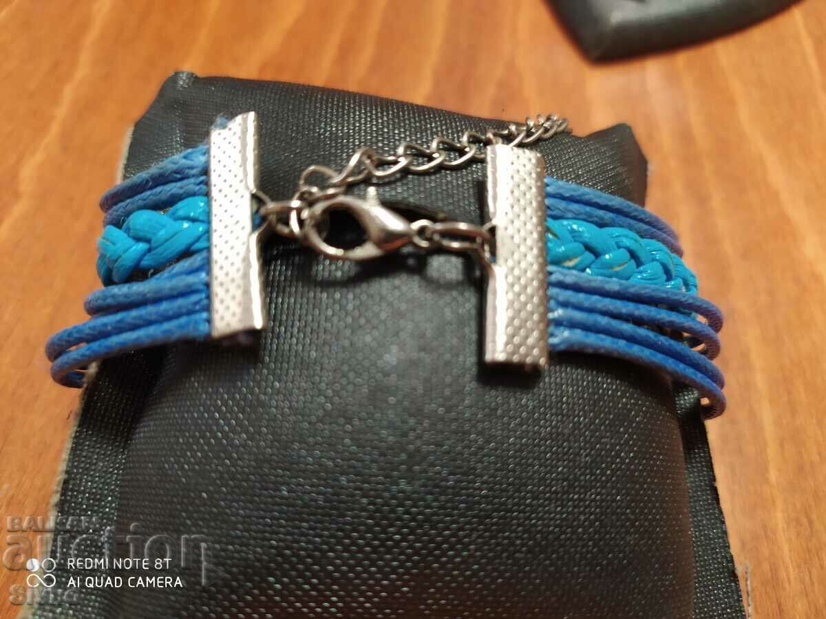 Auction  Bracelet leather and metal