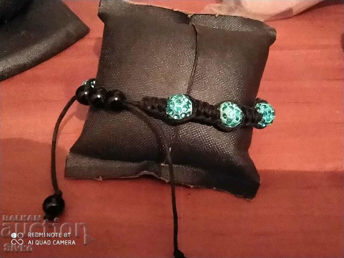 Light blue spheres and textile bracelet with price 0.69 BGN | € 0.35 Light blue spheres and textile bracelet with price 0.69 BGN | € 0.35