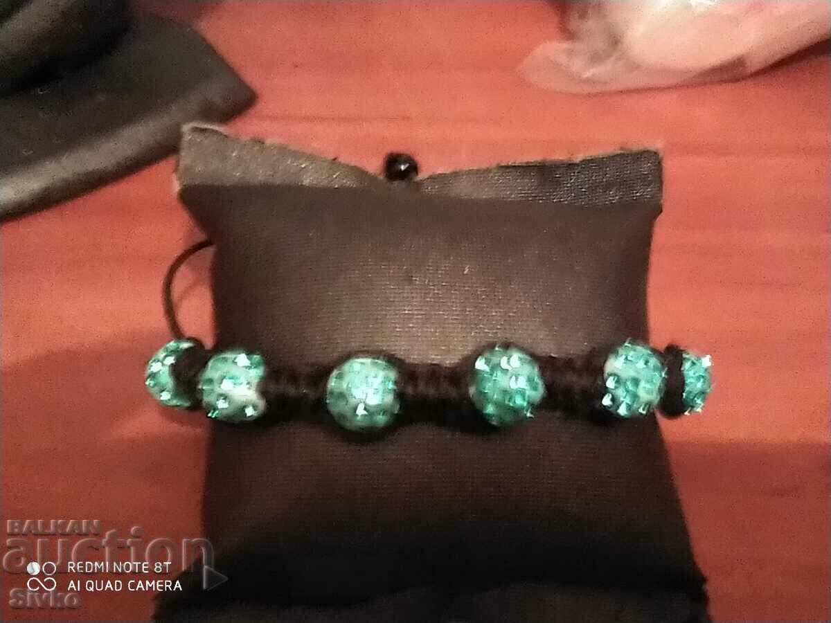 Light blue spheres and textile bracelet Light blue spheres and textile bracelet