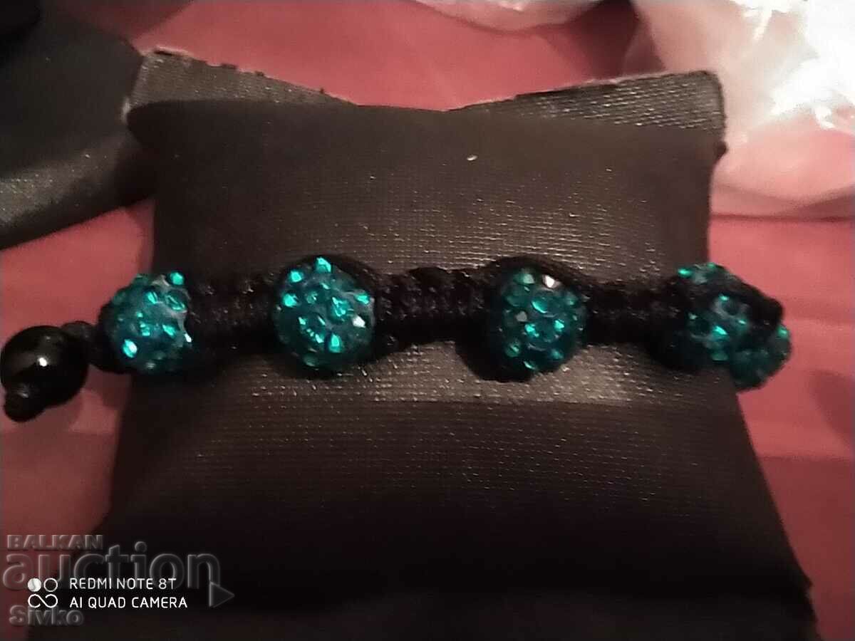 Dark blue spheres and textile bracelet with price 0.79 BGN | € 0.40 Dark blue spheres and textile bracelet with price 0.79 BGN | € 0.40