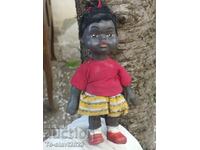 Old little rubber doll -