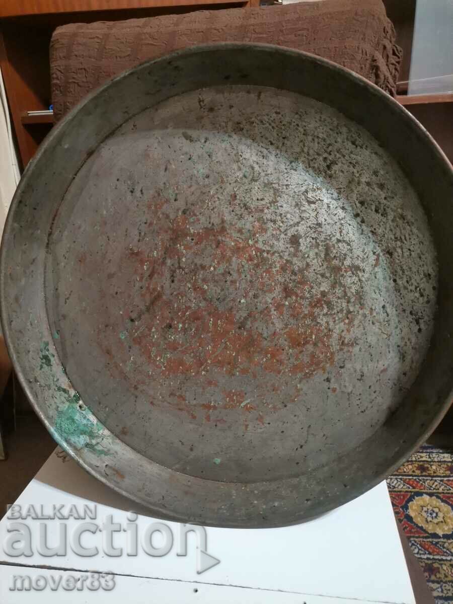 Old copper casserole. Tray.