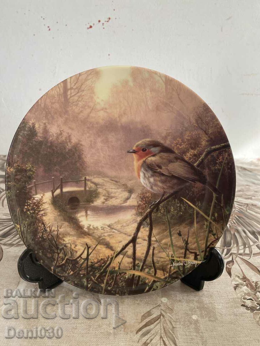 A beautiful limited edition porcelain wall plate with markings