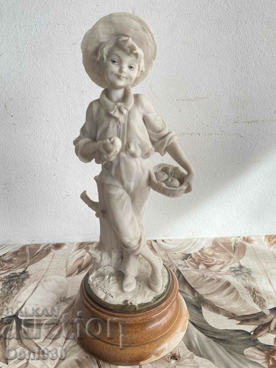 A unique alabaster statuette figure with markings