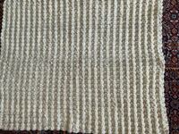 I am selling a woolen baby blanket