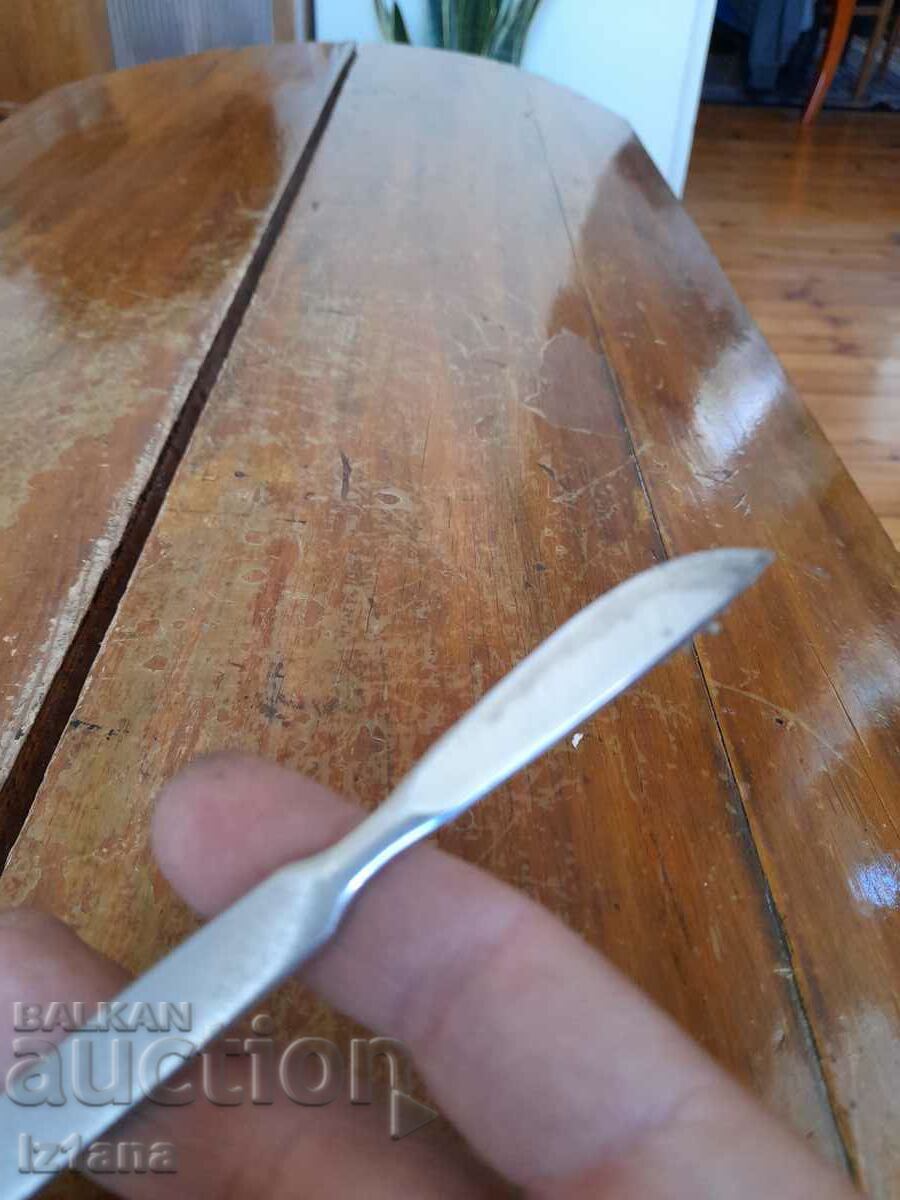 Auction An old scalpel Auction An old scalpel