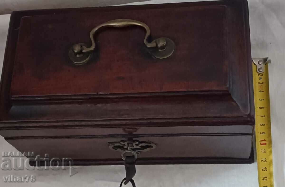 Delivery of Old wooden box with a key for jewelry Delivery of Old wooden box with a key for jewelry