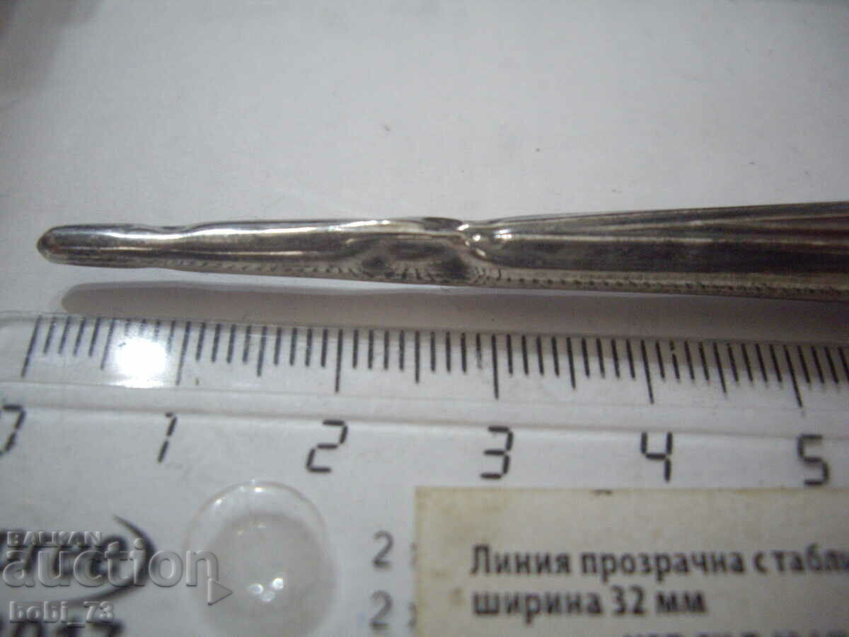 Auction  Old silver pen.