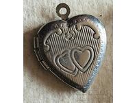 Silver heart shaped ART locket photo pendant.