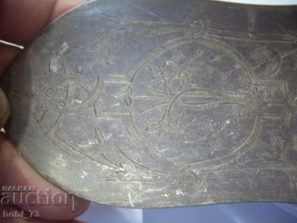 An old pastry spatula. - 7 An old pastry spatula. - 7