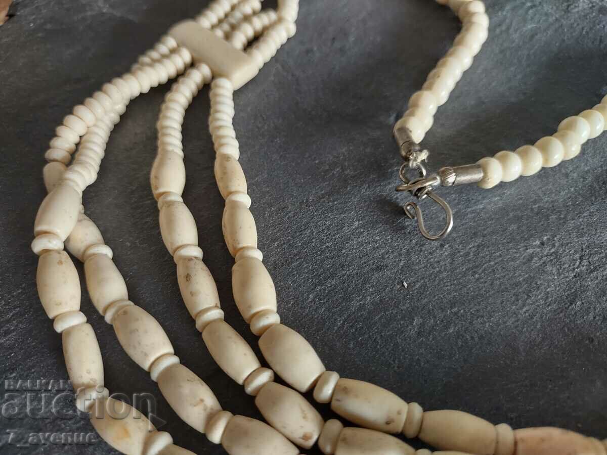 Auction  NECKLACE of bone, 18.04.2024