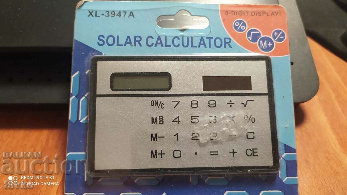 Electronic calculator unused in its packaging