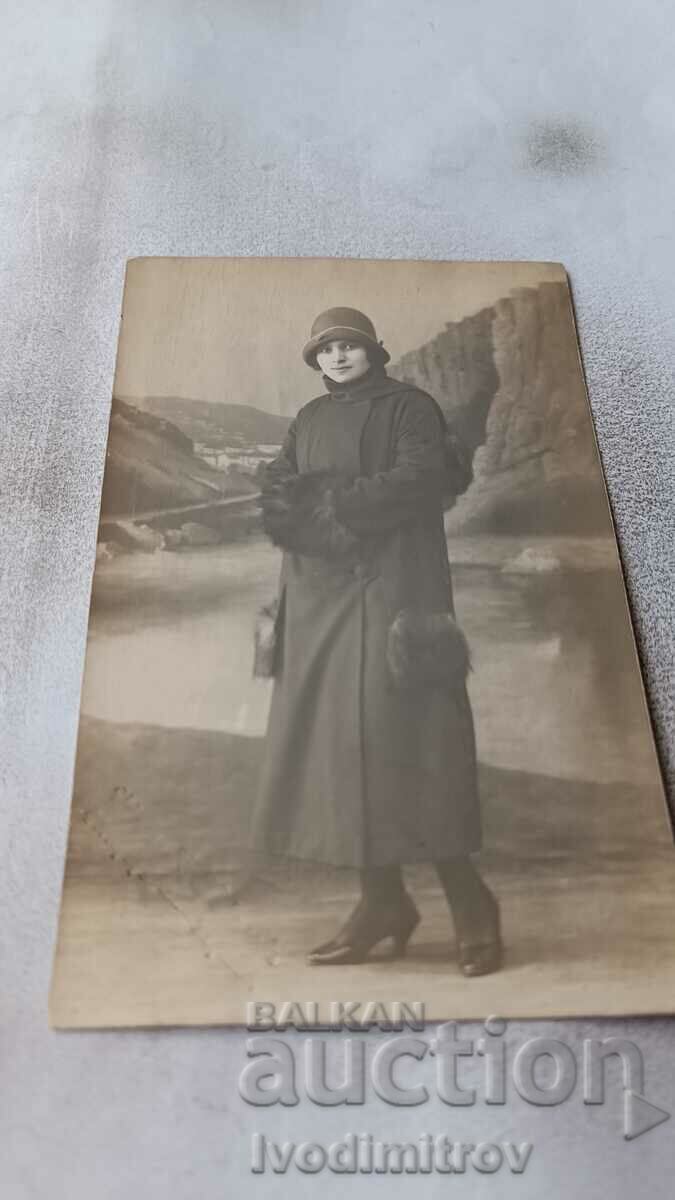 Photo Young woman in a winter coat