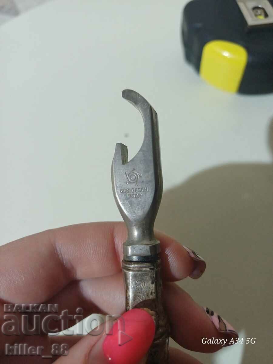 Auction Silver bottle opener Auction Silver bottle opener