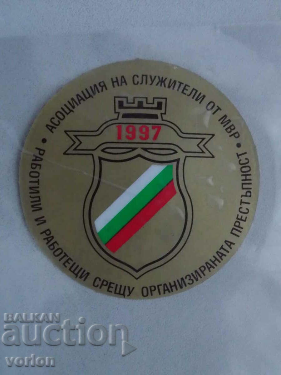 Adhesive for glass: Association of employees of the Ministry of the Interior.