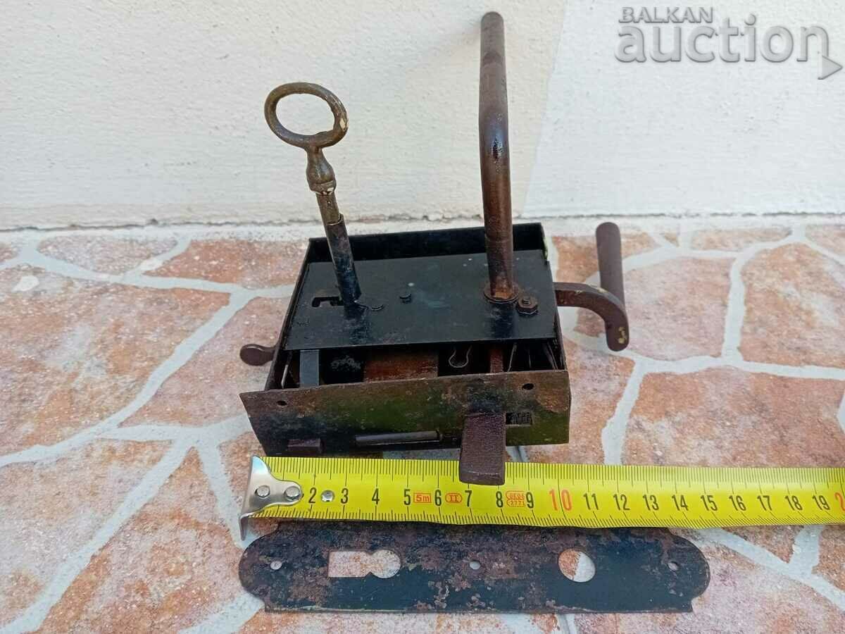 Delivery of ancient primitive lock with bronze key Delivery of ancient primitive lock with bronze key