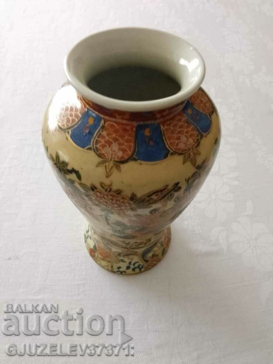 Old porcelain flower vase marked