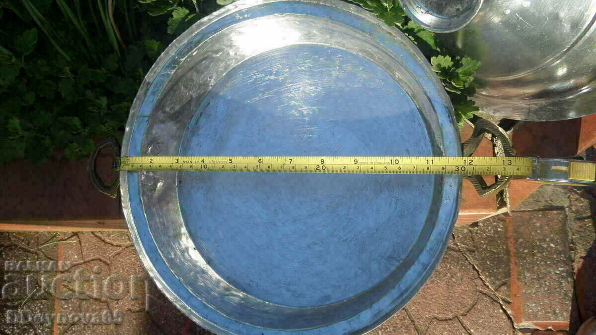 Old copper pan with lid