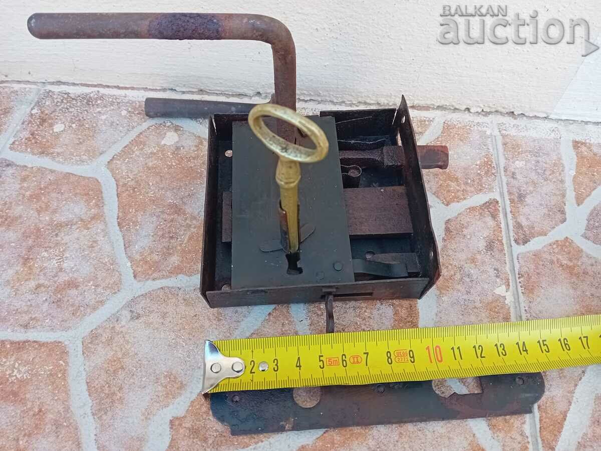 Delivery of ancient primitive lock with bronze key Delivery of ancient primitive lock with bronze key