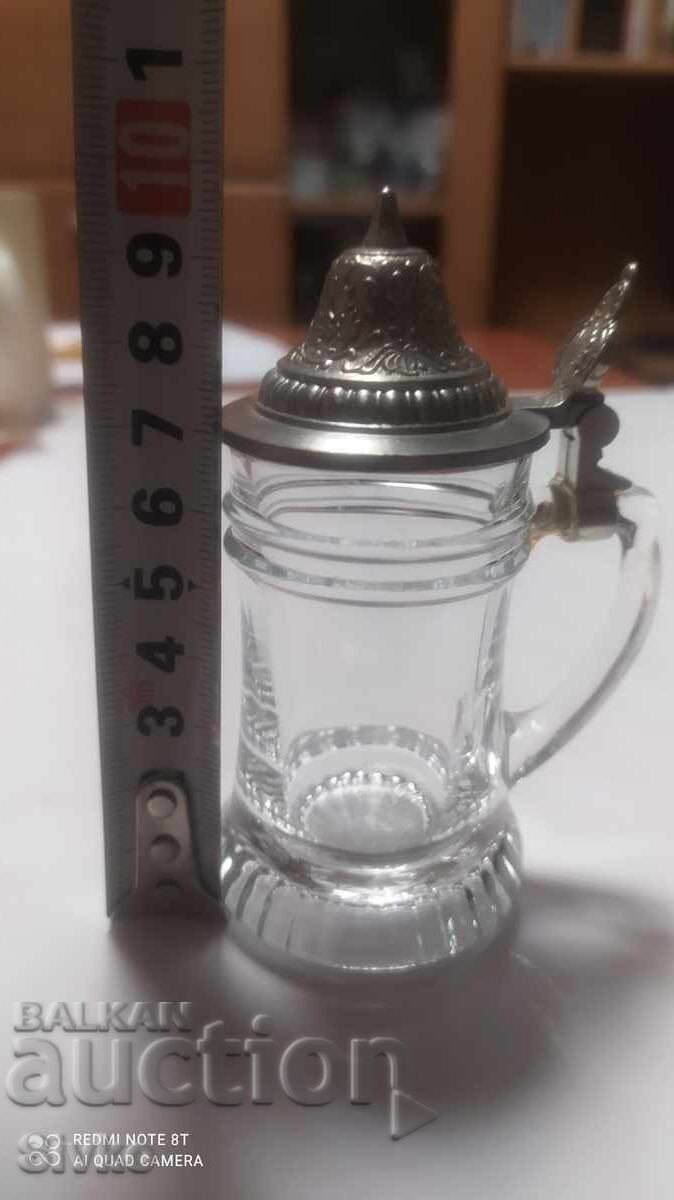 Glass mug with lid with price 4.99 BGN | € 2.55 Glass mug with lid with price 4.99 BGN | € 2.55